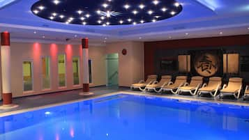 Indoor pool, open 10:00 AM to 9:00 PM, pool loungers