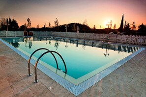 Outdoor pool, pool umbrellas, sun loungers