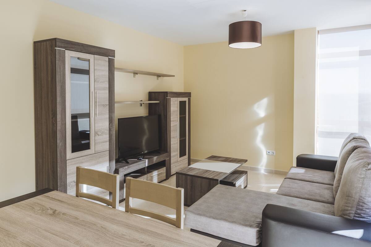 Apartment, 3 Bedrooms | Living room | Flat-screen TV