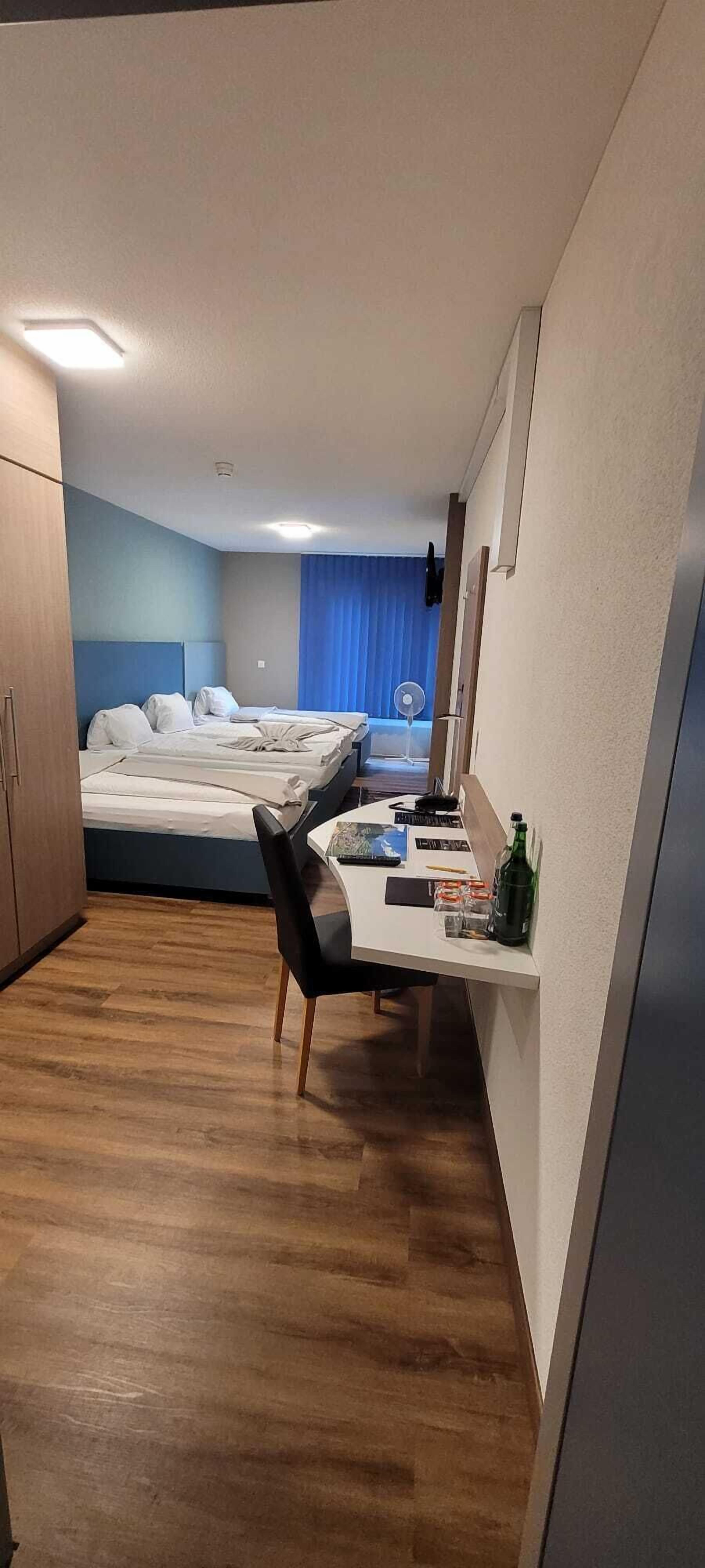 economy quadruple room | 1 bedroom, premium bedding, select comfort beds, in-room safe