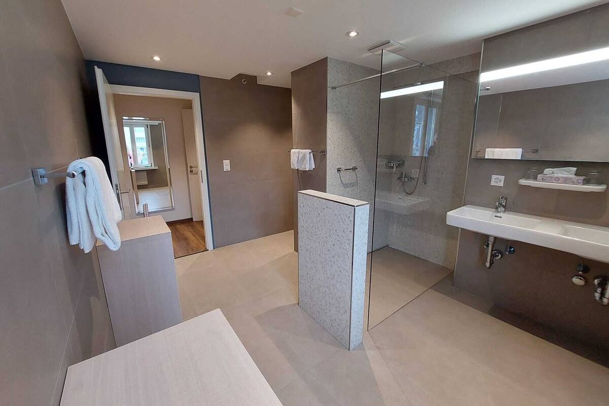 suite | bathroom | hair dryer, bathrobes, heated floors, towels