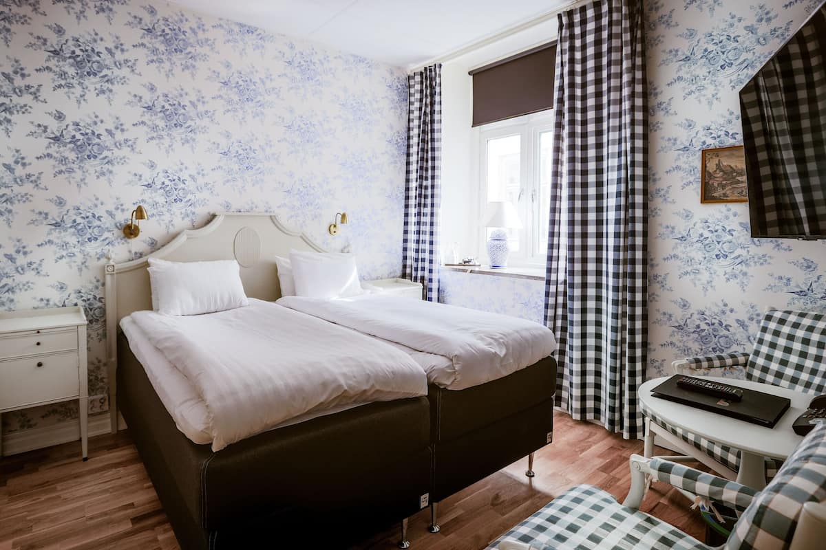 Twin kamer, 2 eenpersoonsbedden (with a Walk) | 1 slaapkamer, een kluis op de kamer, individueel gedecoreerd