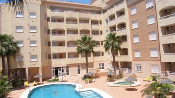 Outdoor pool, open 10:00 AM to 9:00 PM, pool umbrellas, sun loungers