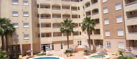 Outdoor pool, open 10:00 AM to 9:00 PM, pool umbrellas, pool loungers