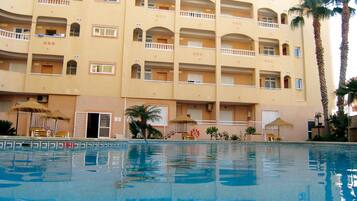 Outdoor pool, open 10:00 AM to 9:00 PM, pool umbrellas, sun loungers