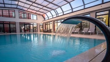 Indoor pool, outdoor pool, pool umbrellas, pool loungers