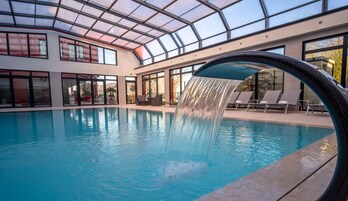 Indoor pool, outdoor pool, pool umbrellas, sun loungers