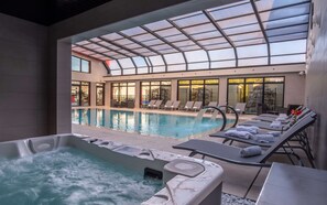 Indoor pool, outdoor pool, pool umbrellas, sun loungers