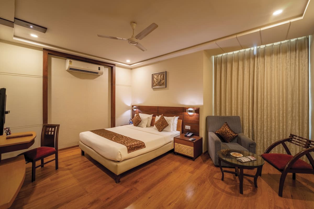 Deluxe Room | Memory foam beds, in-room safe, individually decorated