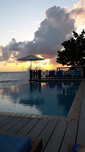 2 outdoor pools, pool umbrellas, pool loungers