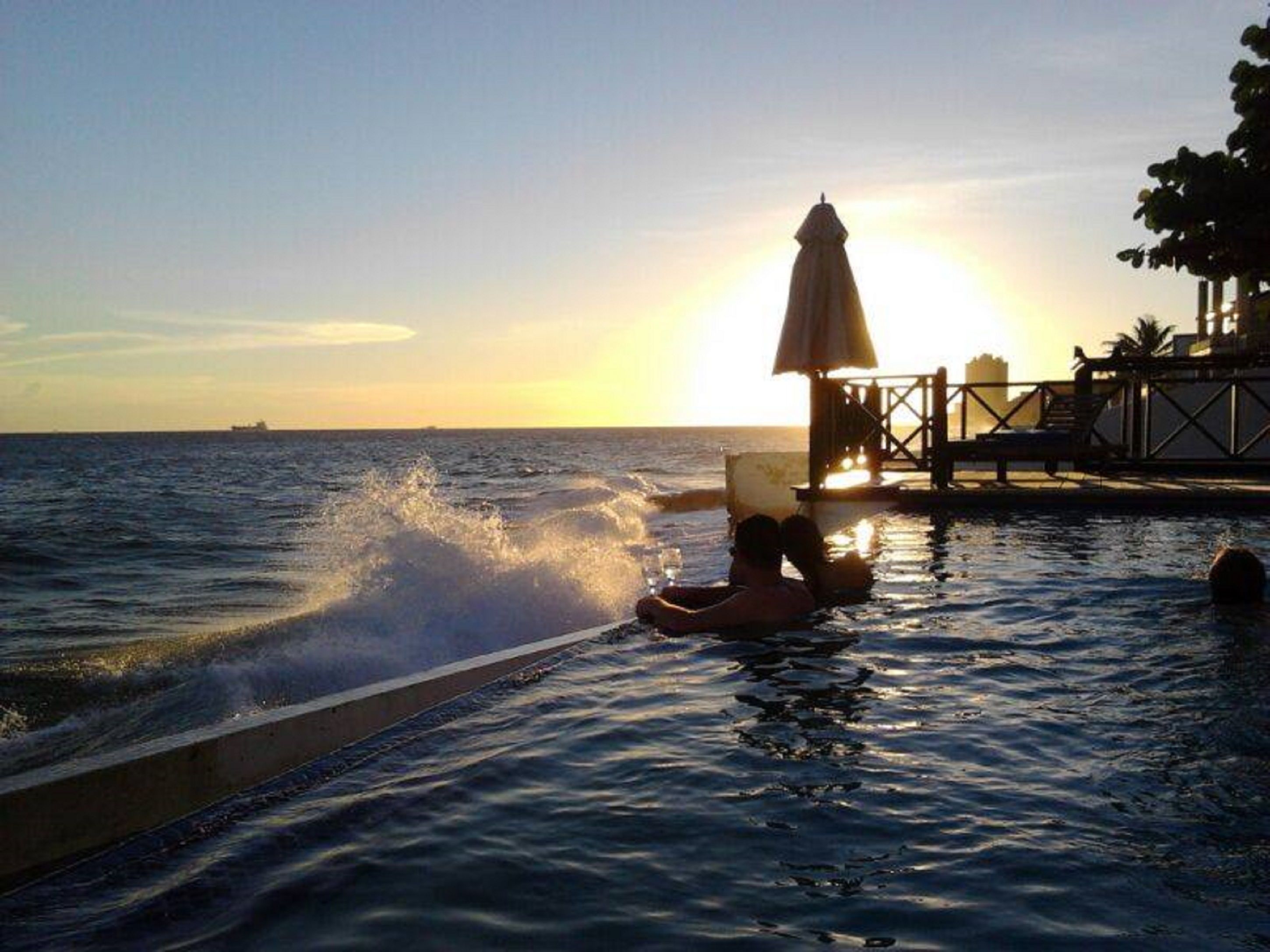 2 outdoor pools, pool umbrellas, pool loungers