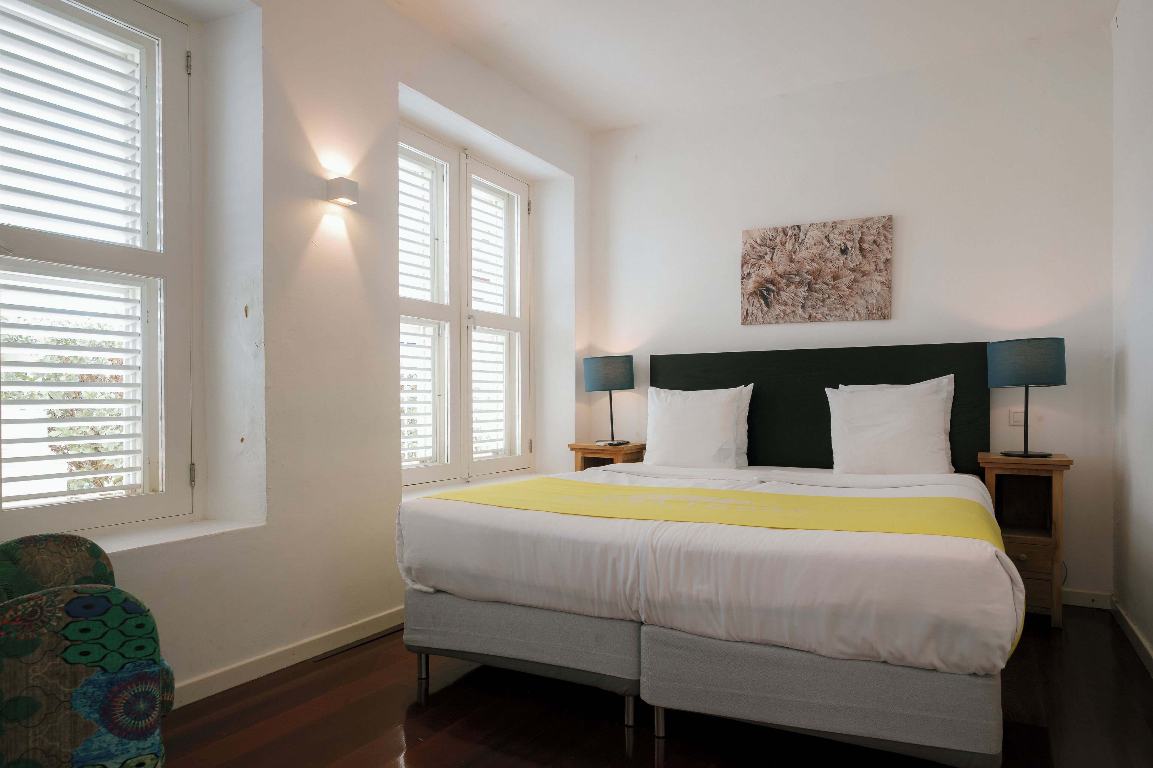 One Bedroom Apartment | Down comforters, in-room safe, individually decorated