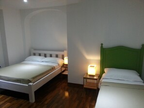 Quadruple Room, Private Bathroom | Premium bedding, individually furnished, free WiFi