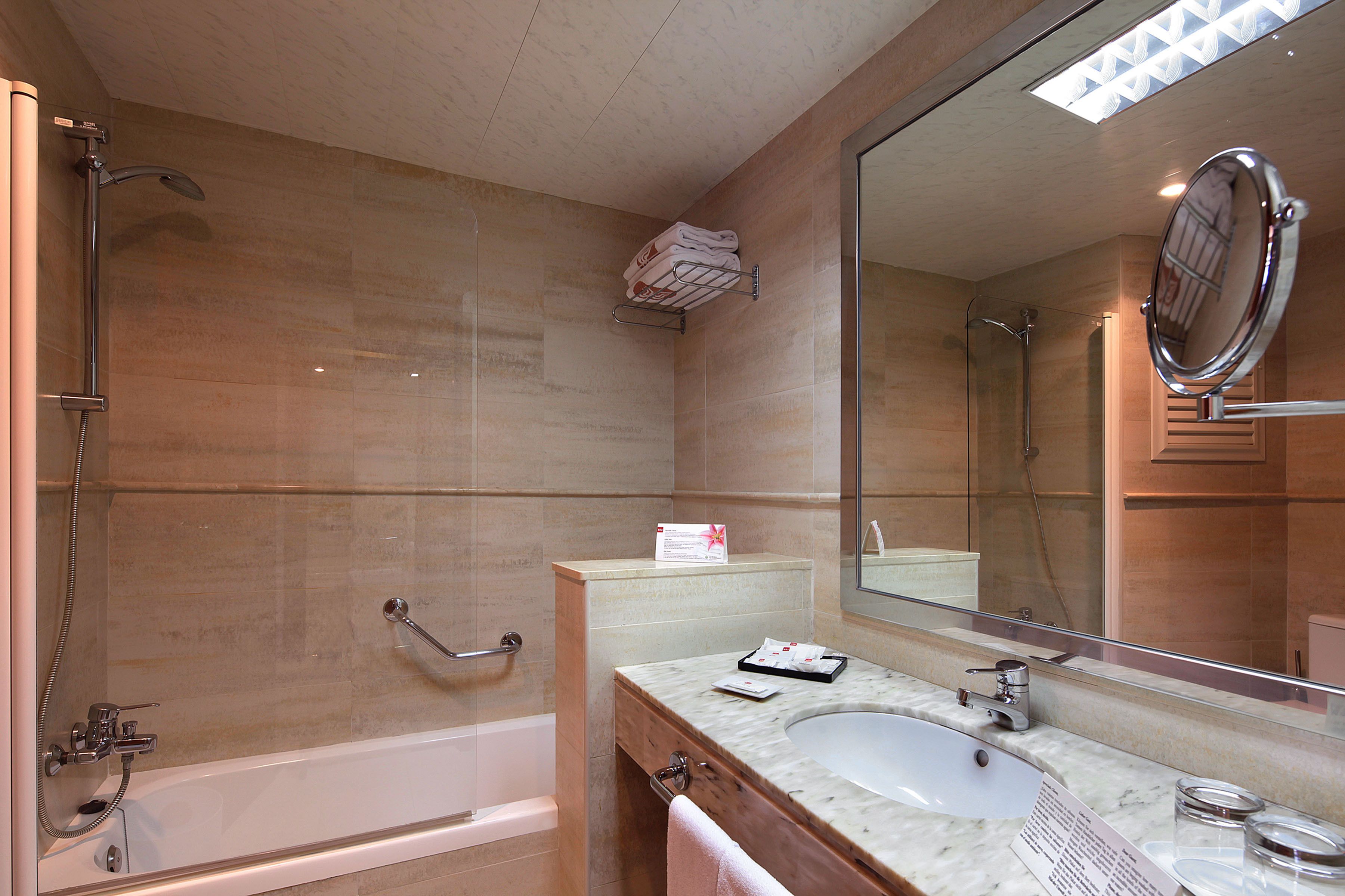 hair dryer, bidet, towels, soap