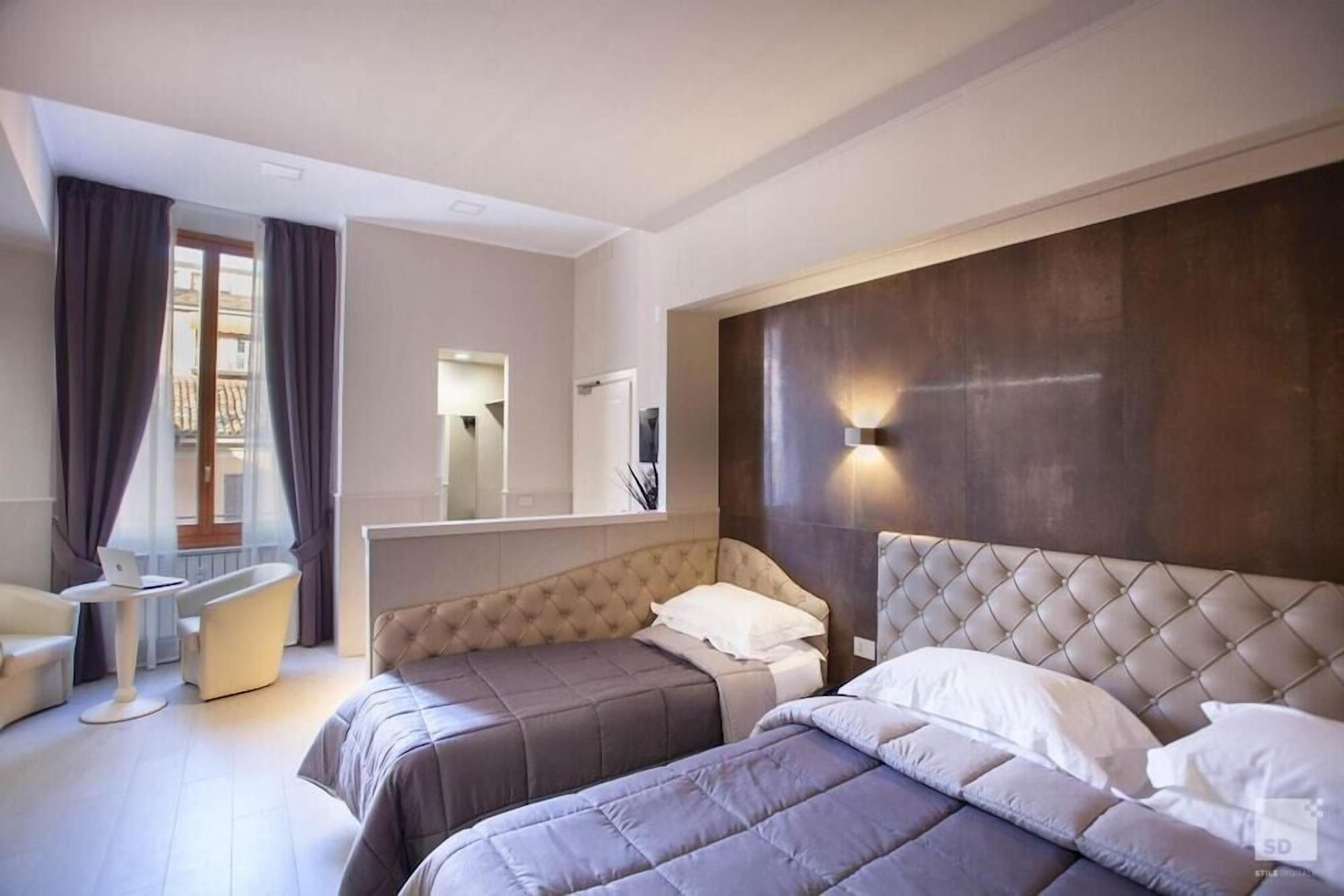 Deluxe Triple Room | Minibar, in-room safe, blackout curtains, free cots/infant beds