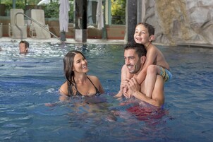 Indoor pool, open 9:00 AM to 9:30 PM, pool loungers