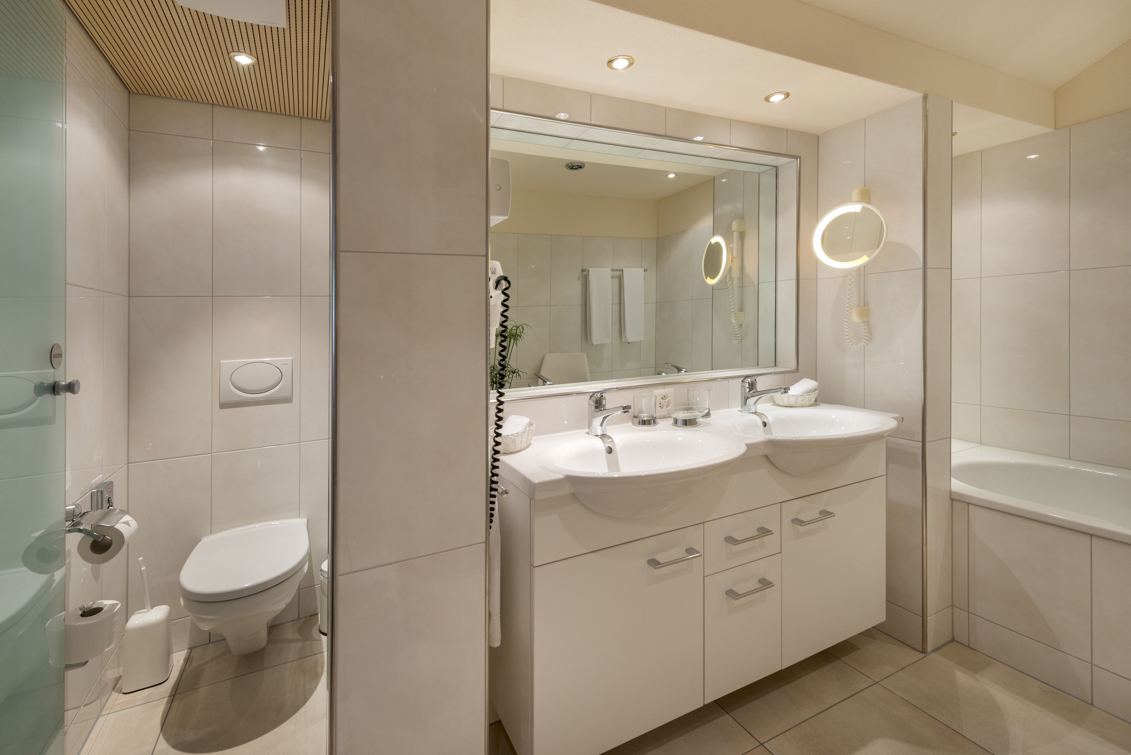 suite | bathroom | hair dryer, bathrobes, slippers, towels