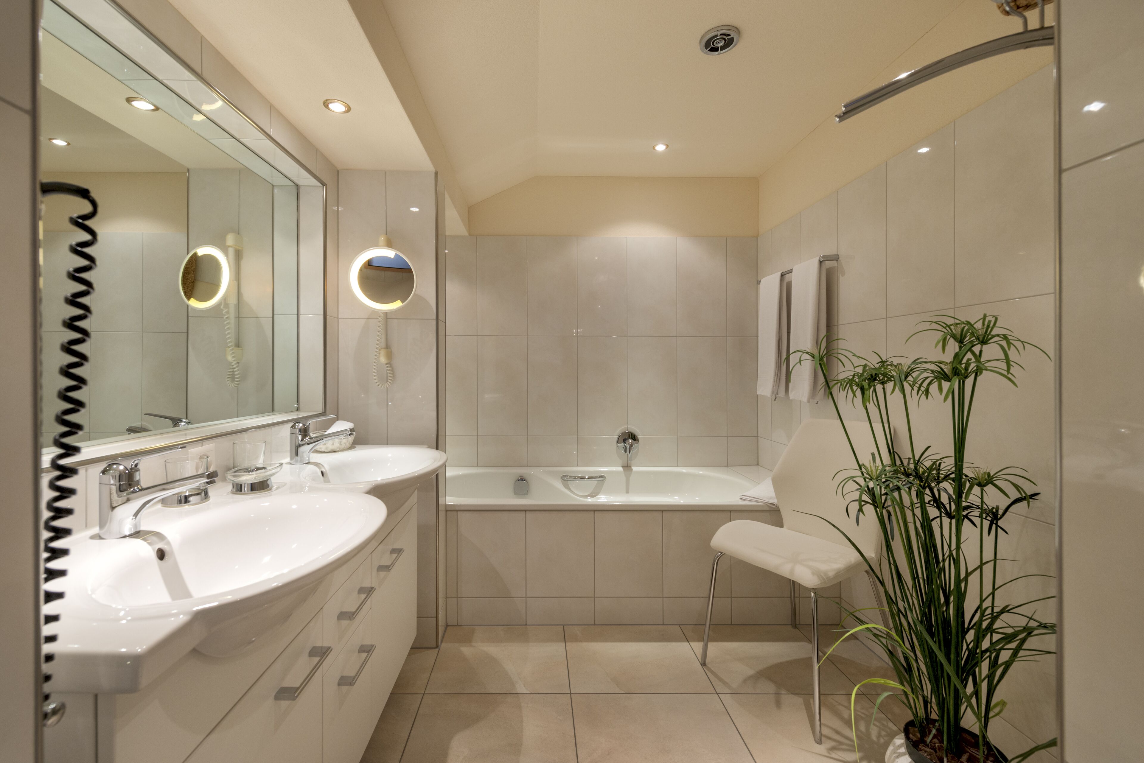 suite | bathroom | hair dryer, bathrobes, slippers, towels