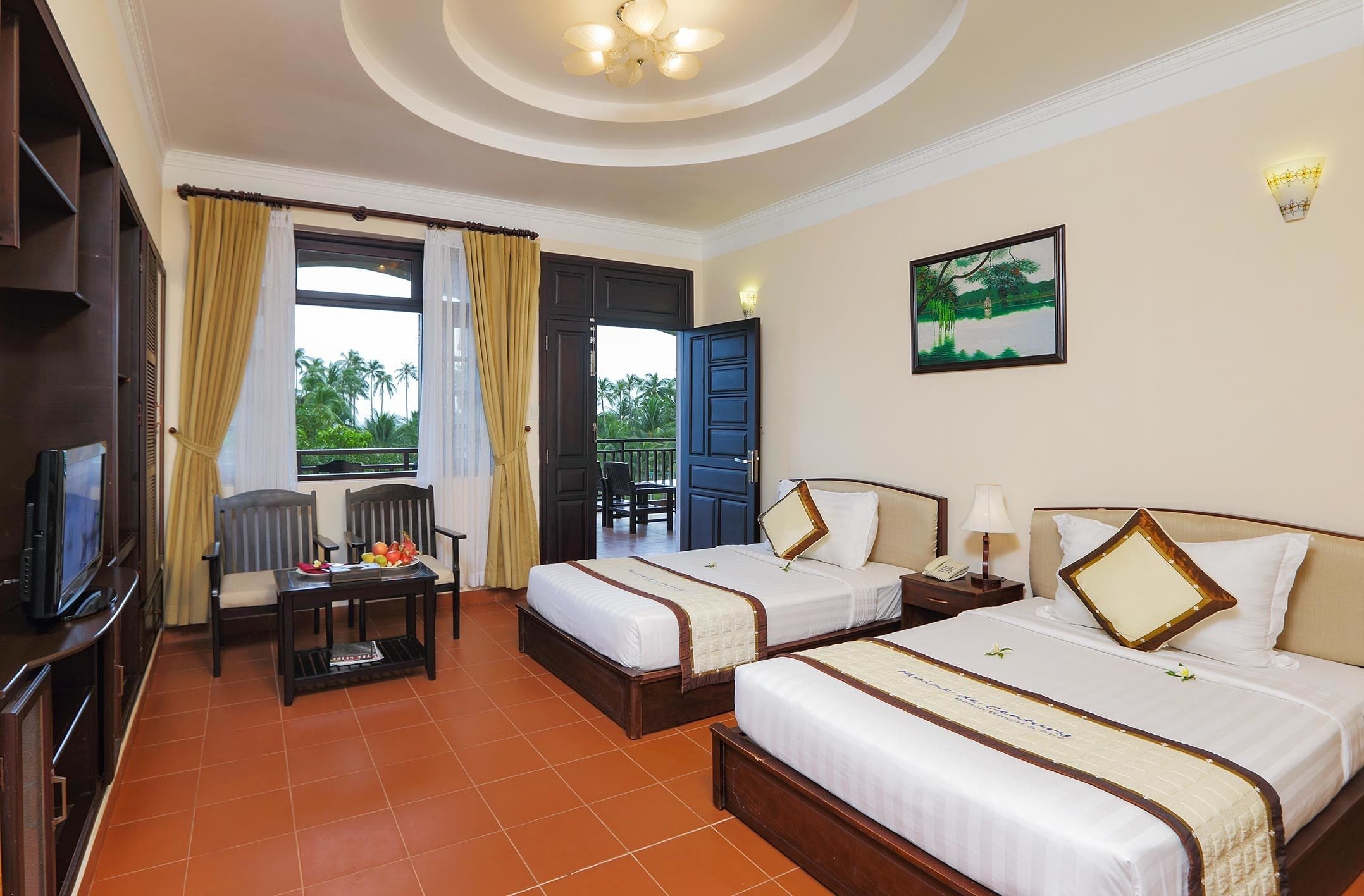 deluxe room, pool view | living area | lcd tv