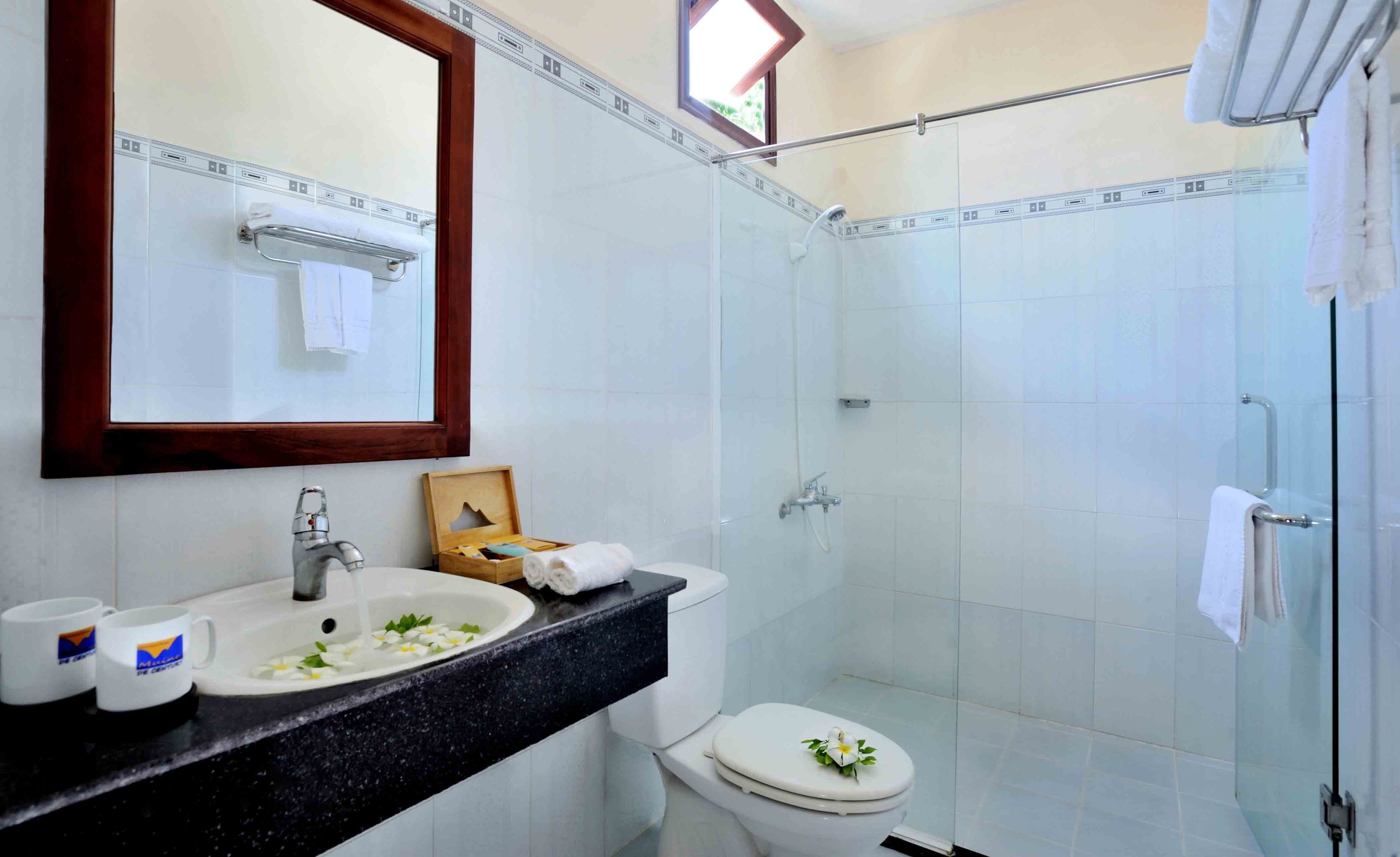 superior room, garden view | bathroom | free toiletries, hair dryer, slippers, towels