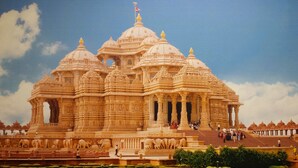 A detailed temple with multiple domes and intricate carvings. - Hotel Silver Stone (New Delhi)