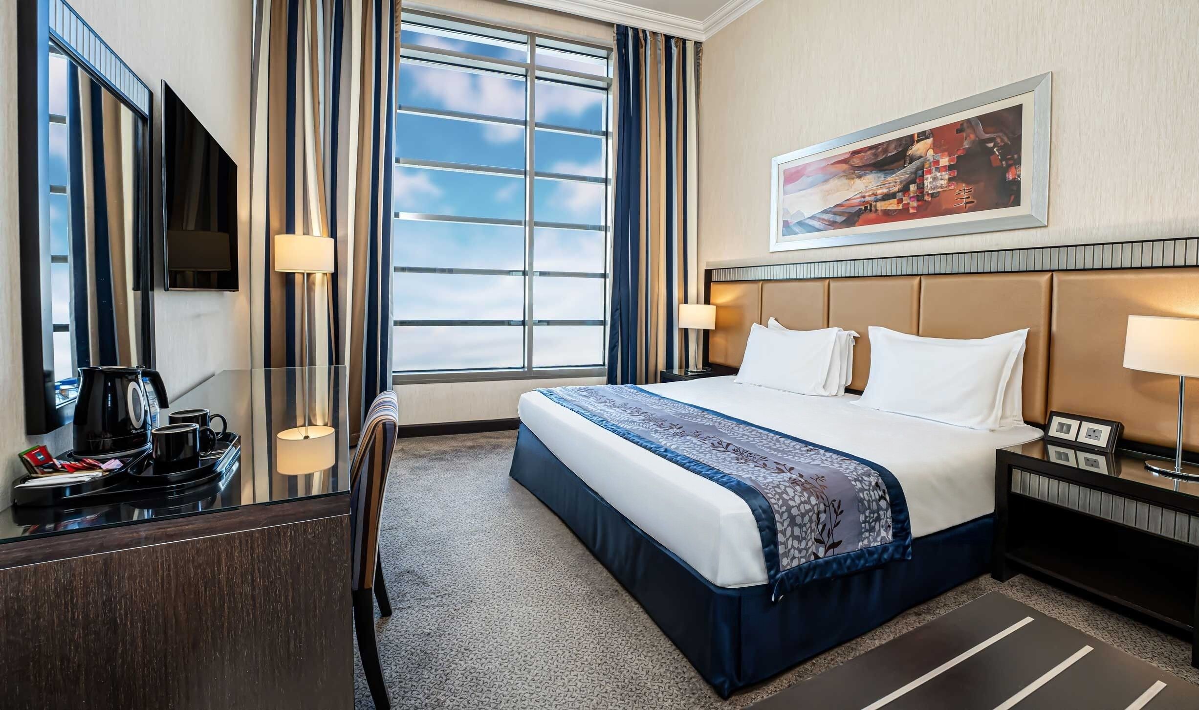 Suite, 1 slaapkamer | 1 slaapkamer, luxe beddengoed, Select Comfort-bedden, een minibar