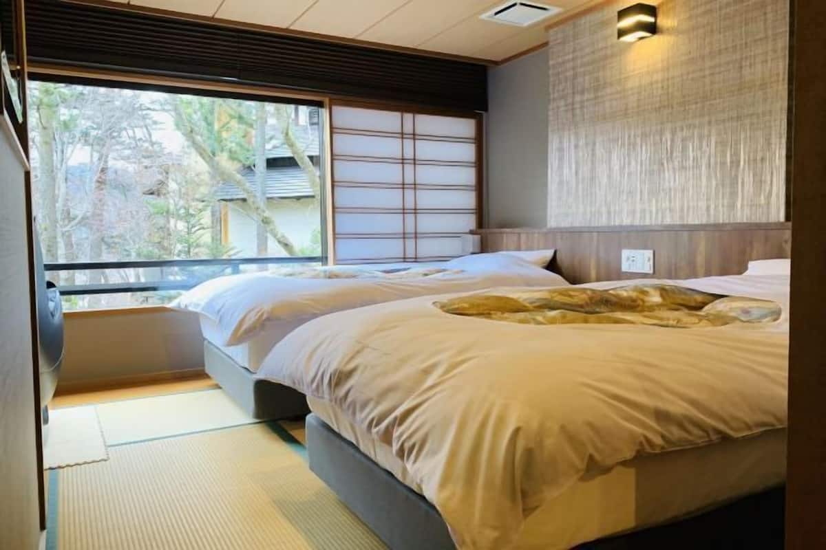 Hypo-allergenic bedding, down duvets, in-room safe