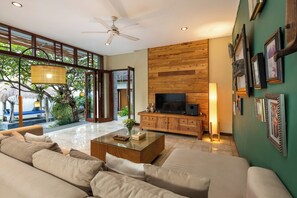 46-inch flat-screen TV with cable channels, TV, DVD player