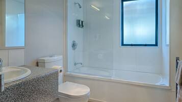 King Spa Studio | Bathroom | Hair dryer, towels, soap, shampoo