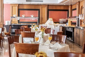 Breakfast and dinner served, international cuisine