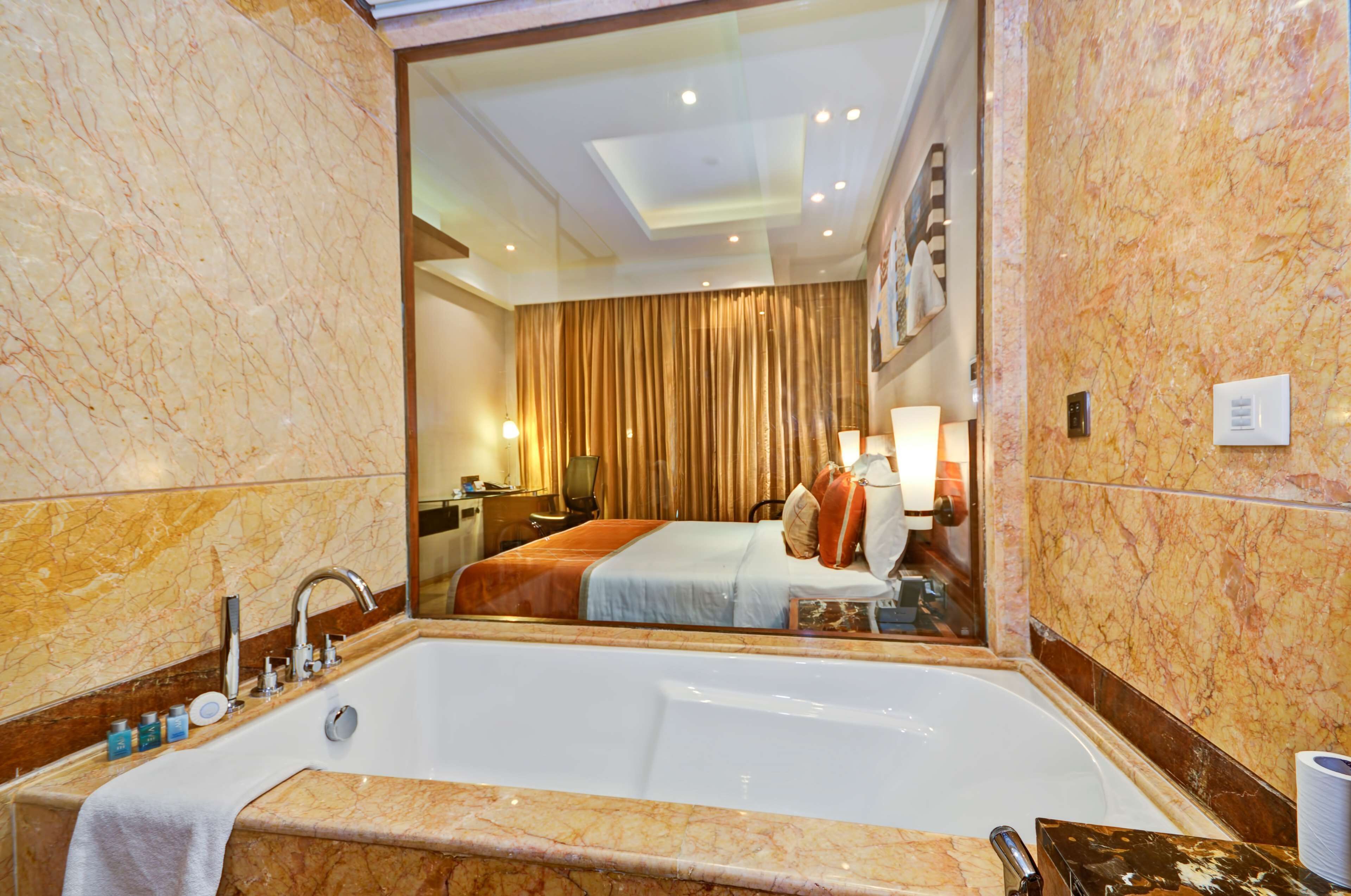 business room | bathroom | rainfall showerhead, free toiletries, hair dryer, bathrobes