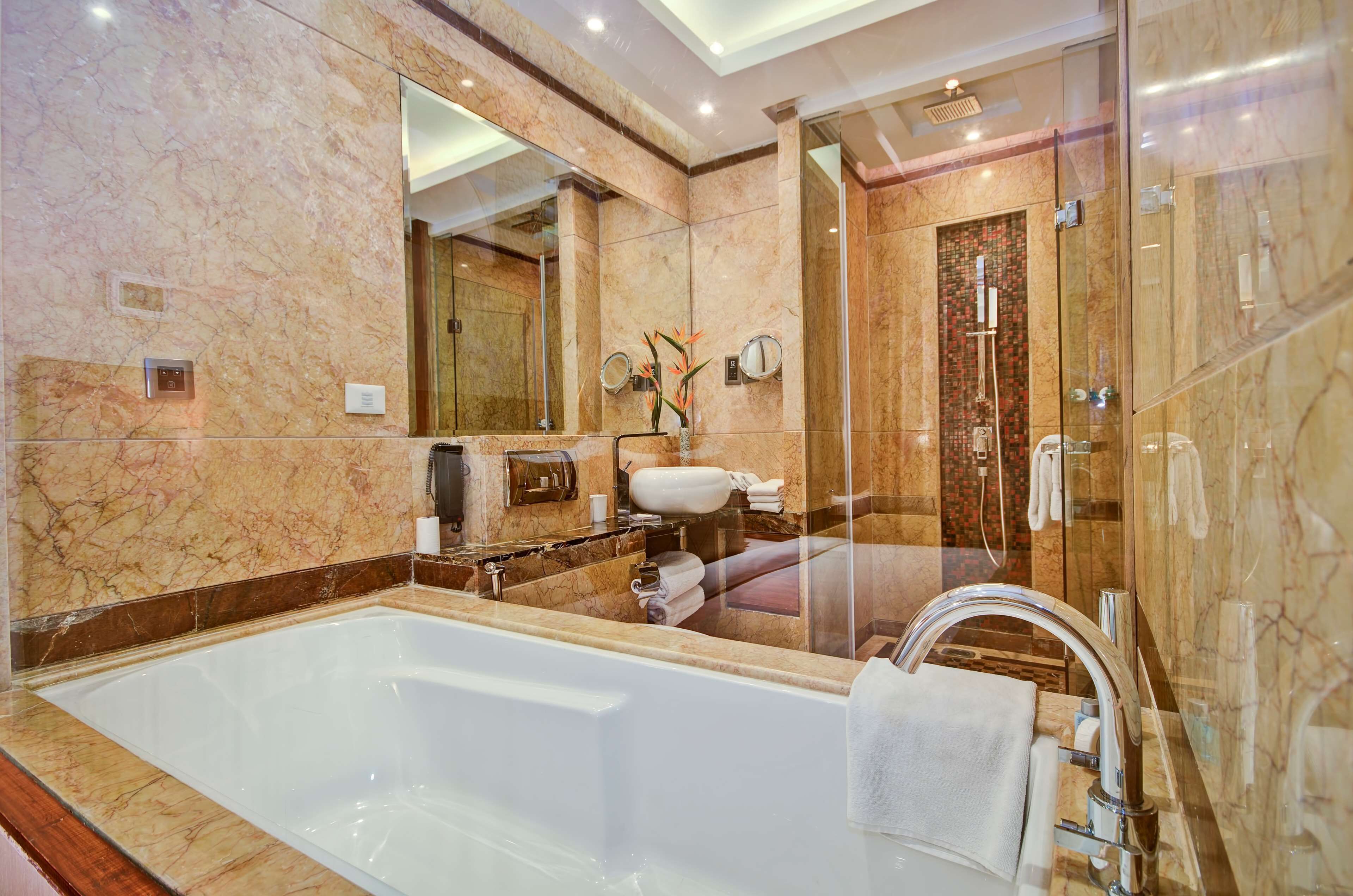 business room | bathroom | rainfall showerhead, free toiletries, hair dryer, bathrobes