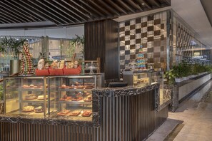 Indulge in our beautifully presented dessert display, featuring a variety of sweet treats.