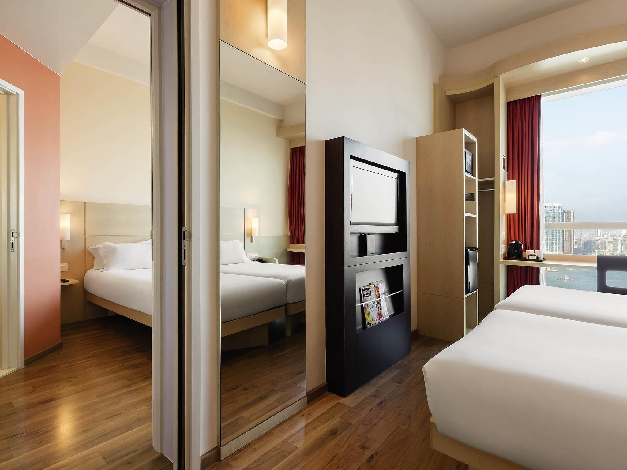 Family Room, Multiple Beds | In-room safe, desk, laptop workspace, blackout curtains