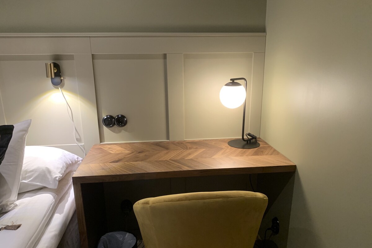 Premium bedding, pillowtop beds, desk, blackout drapes