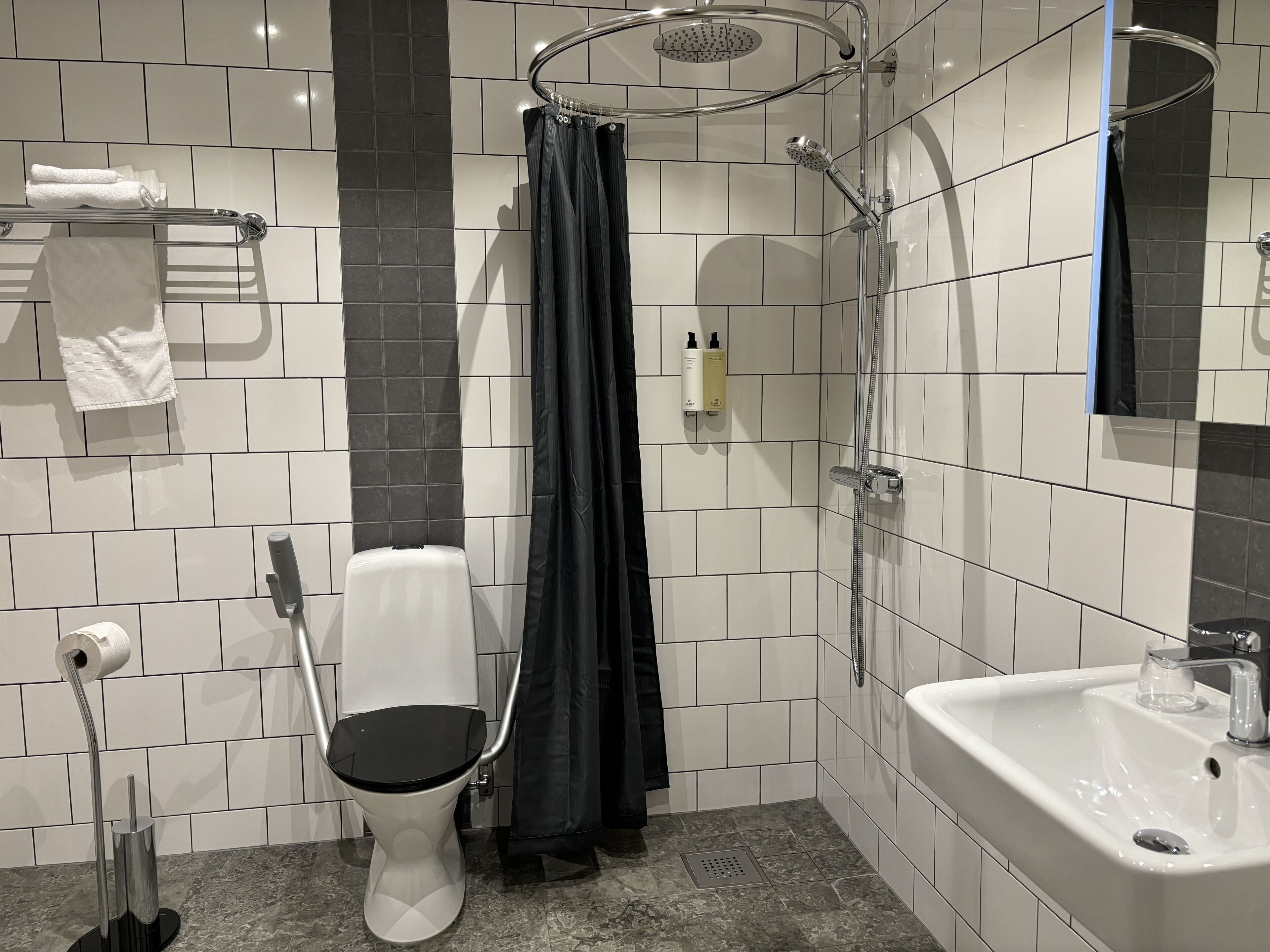 family room with three beds | bathroom | shower, hair dryer, heated floors, towels