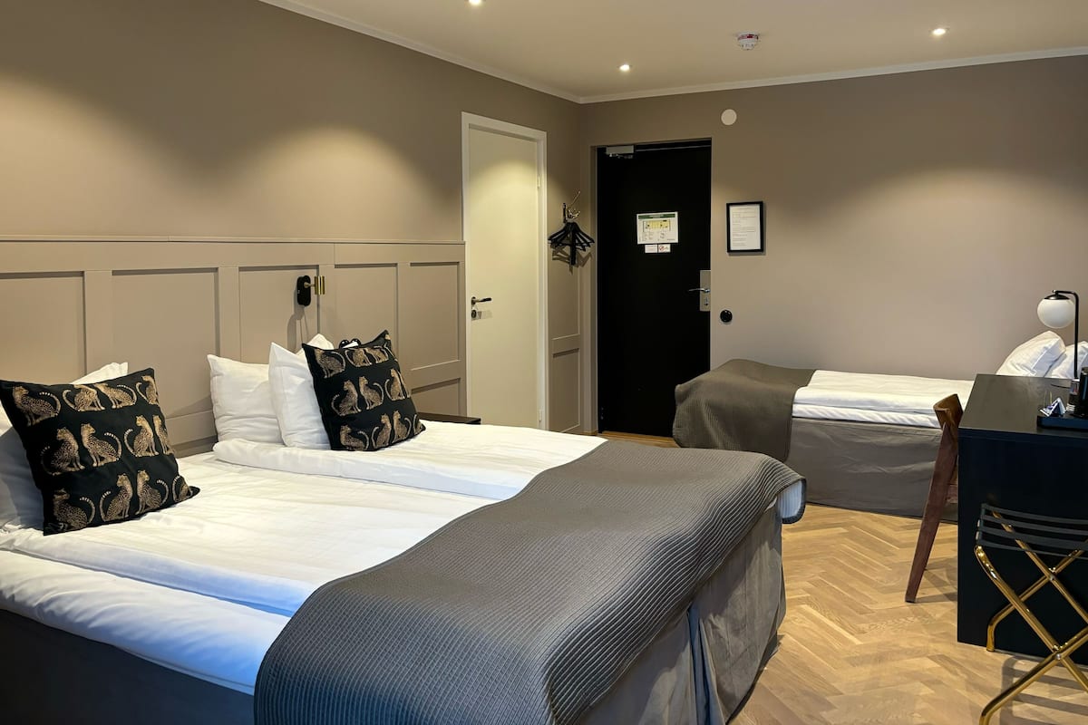 family room with three beds | 1 bedroom, premium bedding, pillow-top beds, individually decorated