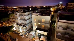 A multi-story hotel with balconies and a courtyard. - Hotel Marina Bay (Rimini)