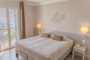 Quarto superior, vista para o mar | Escrivaninha, cortinas blackout, quartos à prova de som