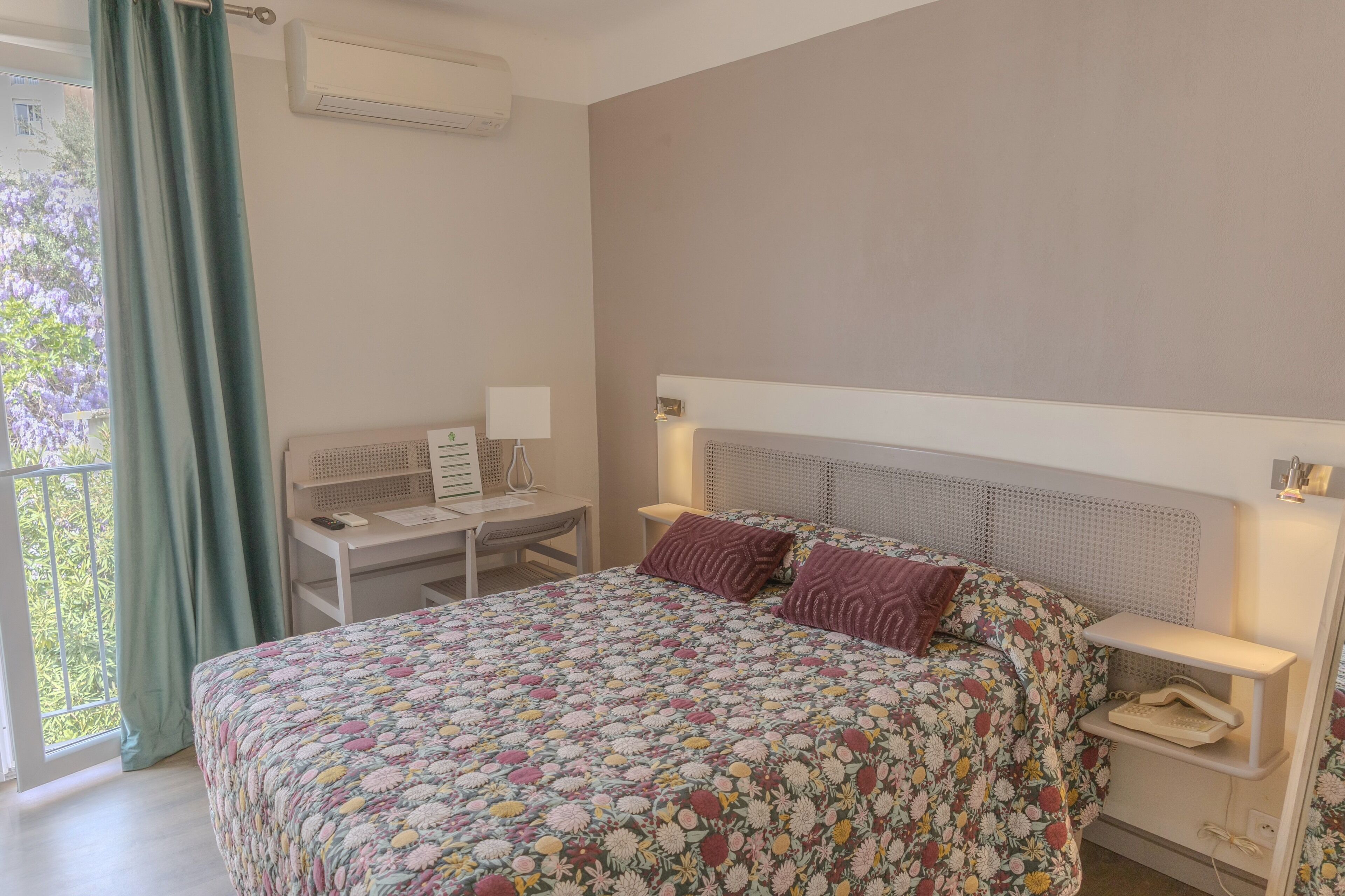 family room | desk, blackout curtains, soundproofing, iron/ironing board