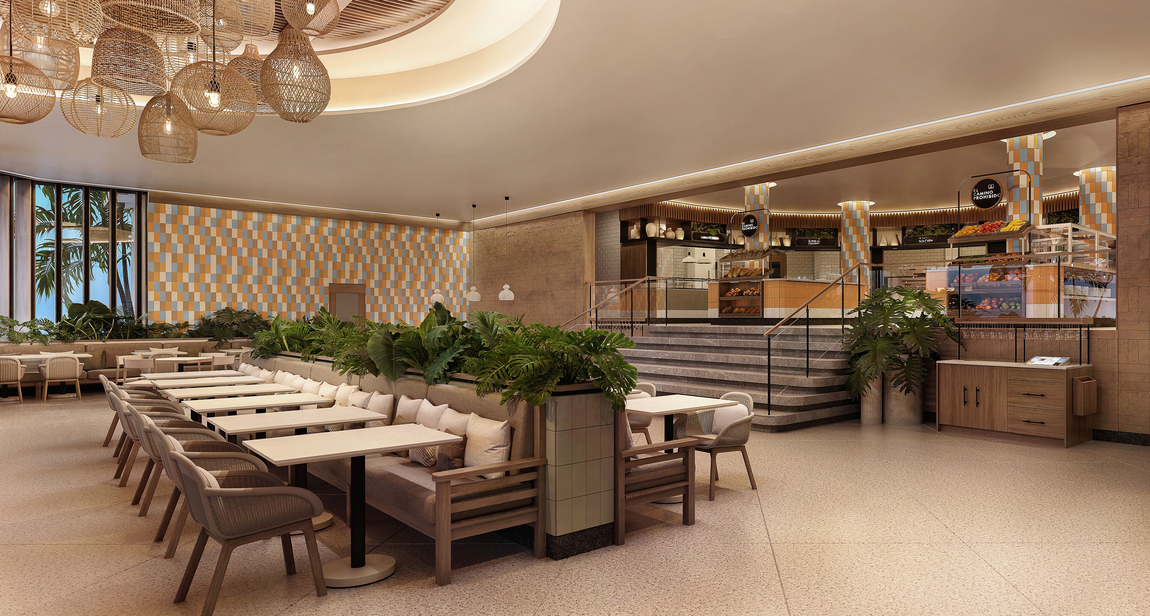 A spacious restaurant with a long counter, multiple seating areas, and a staircase leading to an upper level.
