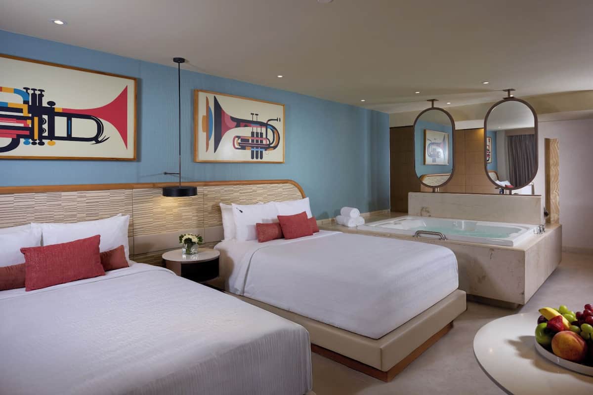 Premium bedding, down comforters, minibar (free items), in-room safe