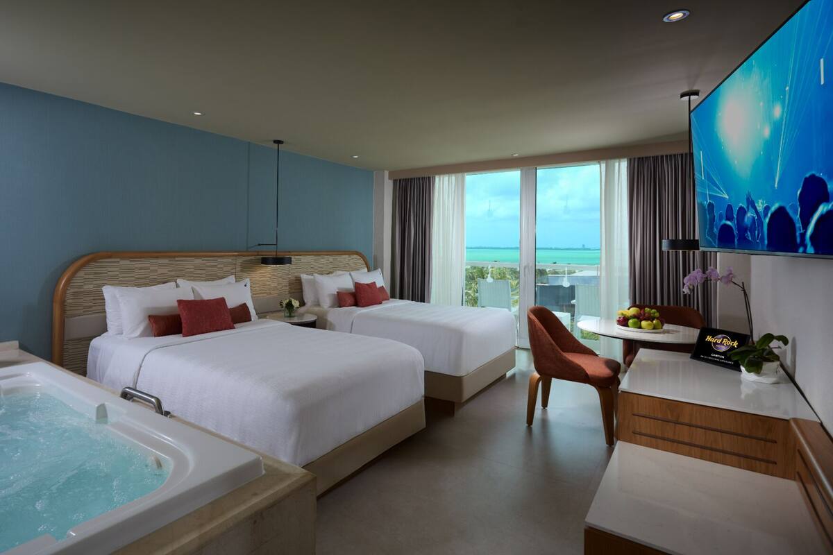 Deluxe Double Room, 2 Double Beds, Lagoon View | Premium bedding, down comforters, minibar (free items), in-room safe