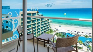 A balcony with a view of a beach and ocean. - Hard Rock Hotel Cancun -  All Inclusive  (Cancun)