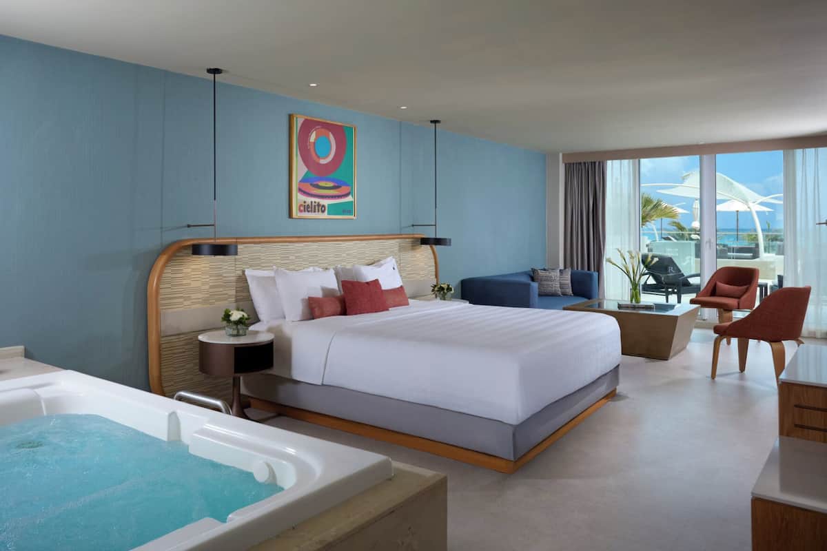 Rock Royalty Ocean View King | Premium bedding, down comforters, minibar (free items), in-room safe