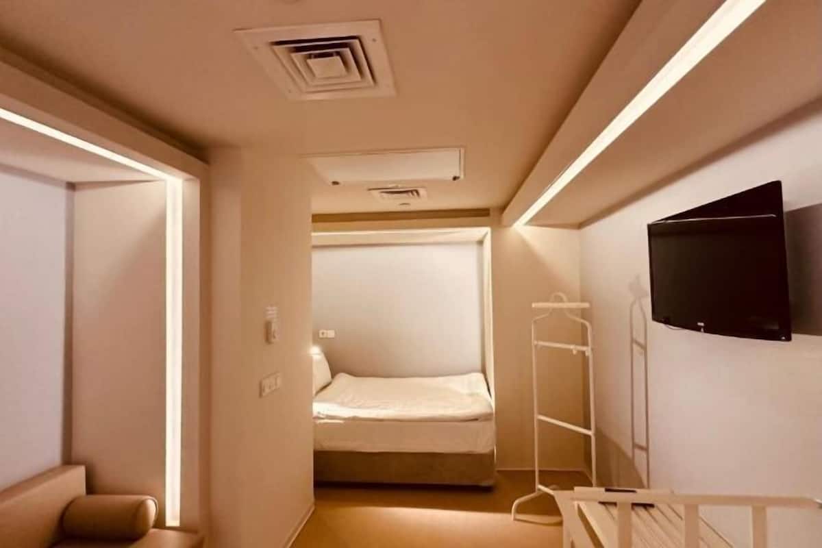 Biancheria da letto di alta qualità, una cassaforte in camera