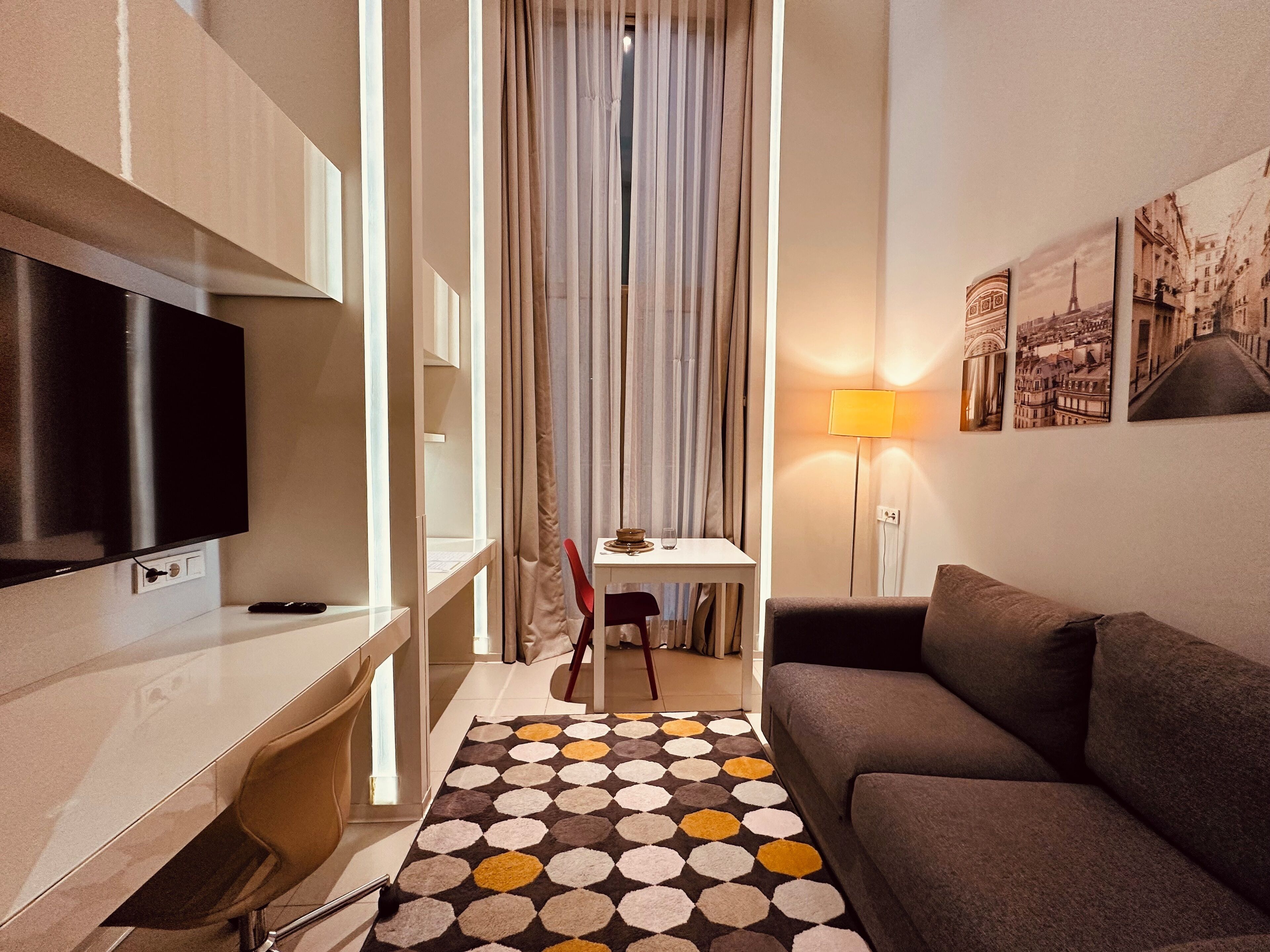 Standard Double Room, 1 King Bed | Living area | 35-inch Smart TV with satellite channels