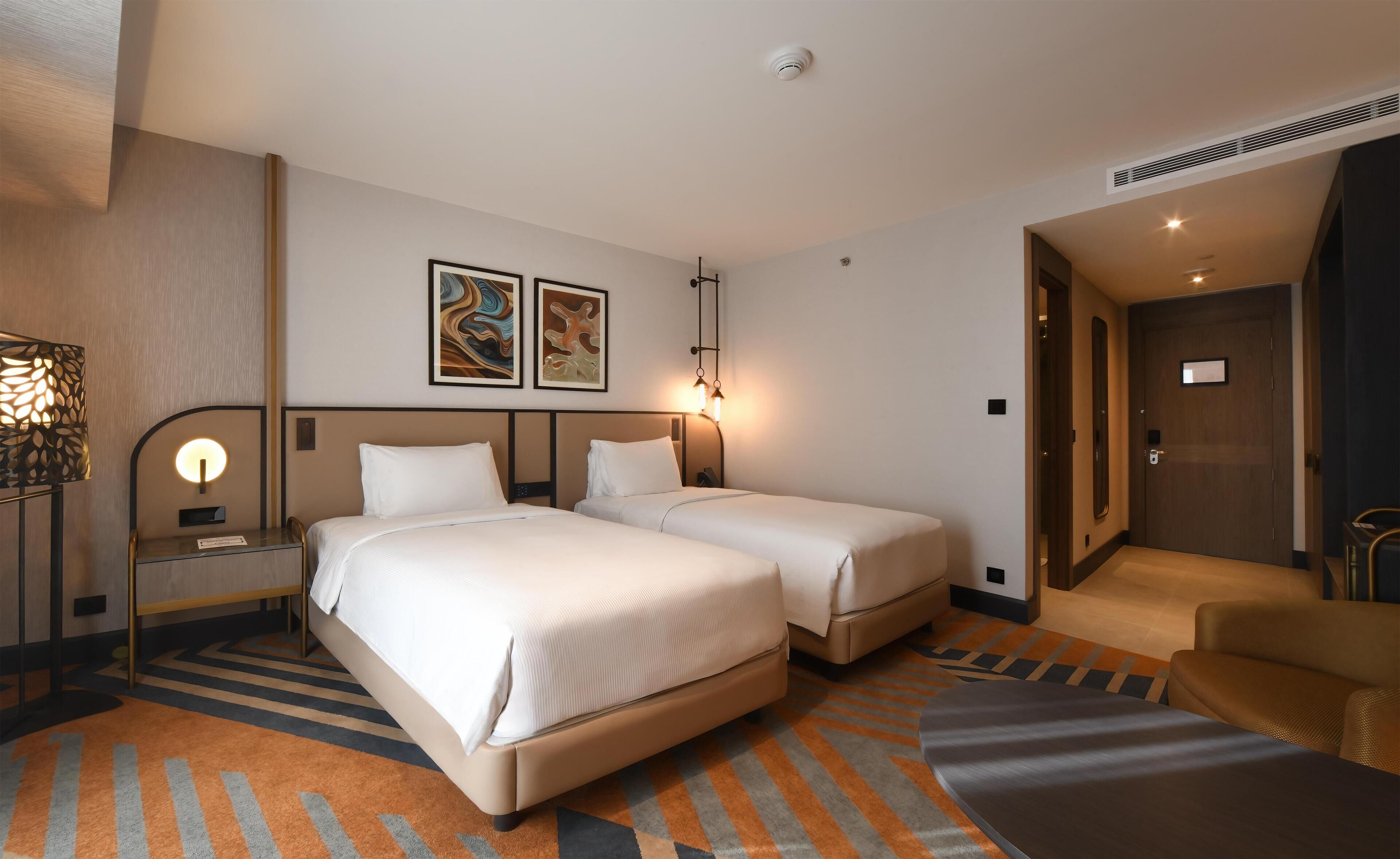 Premium Twin Room, 2 Twin Beds | 2 bedrooms, premium bedding, down comforters, minibar