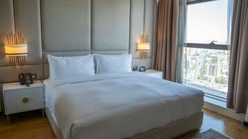 Suite, 1 King Bed | 2 bedrooms, premium bedding, down comforters, minibar