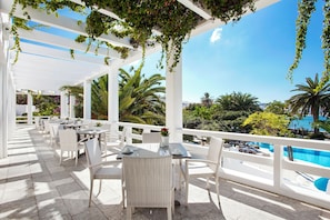 Lunch, dinner served; Mediterranean cuisine, pool views